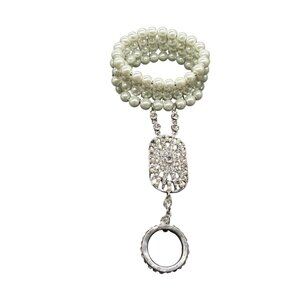 1920s flapper-style faux pearl bracelet with a crystal ring